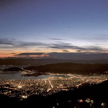 View from Makrinitsa, when the city lights of Volos are turned on under the moonlight.