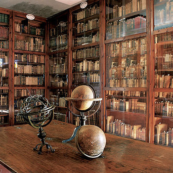 Well organized the Library of Milies, home of spirit and memories, guards whatever is left of the precious books, manuscripts and instruments gathered by the 3 visionary cousins, Anthimos Gazis, Daniil Filipides and Grigorios Kostantas. The table - desk - bed of ascetic Kostantas, director of the school, is here, a challenge to our consumerism.